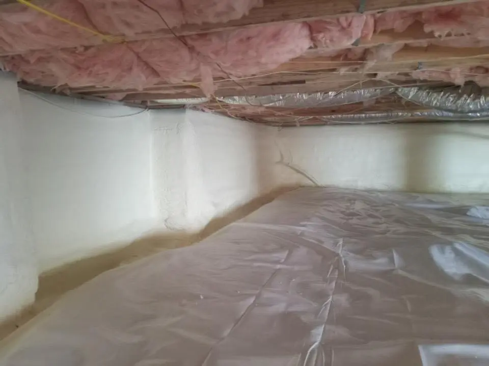 Crawl space encapsulation with closed-cell spray foam for Commercial Roof Restoration in Albion